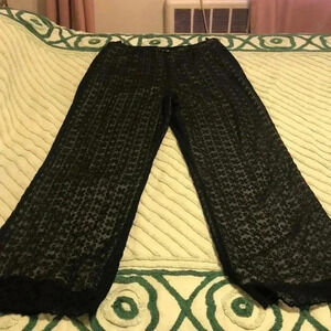 Odille Anthropologie lace floral lined pants.